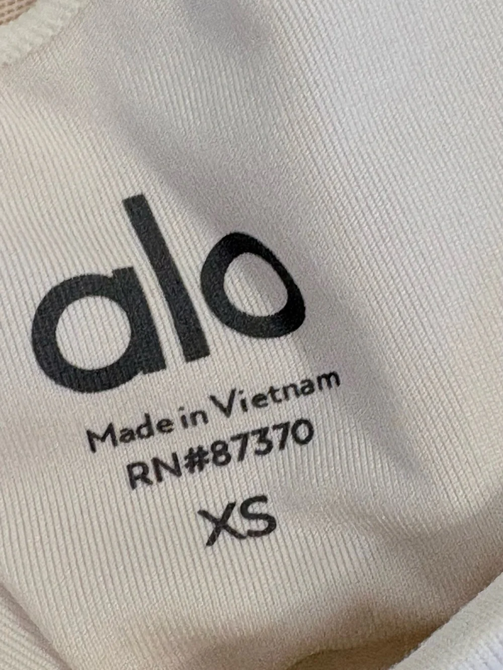 ALO Yoga Wild Thing Padded Racerback Sports Bra in white size XS